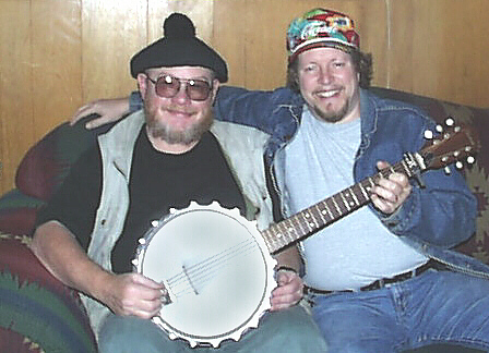 [Rex F. May, L. Neil Smith, Banjo]